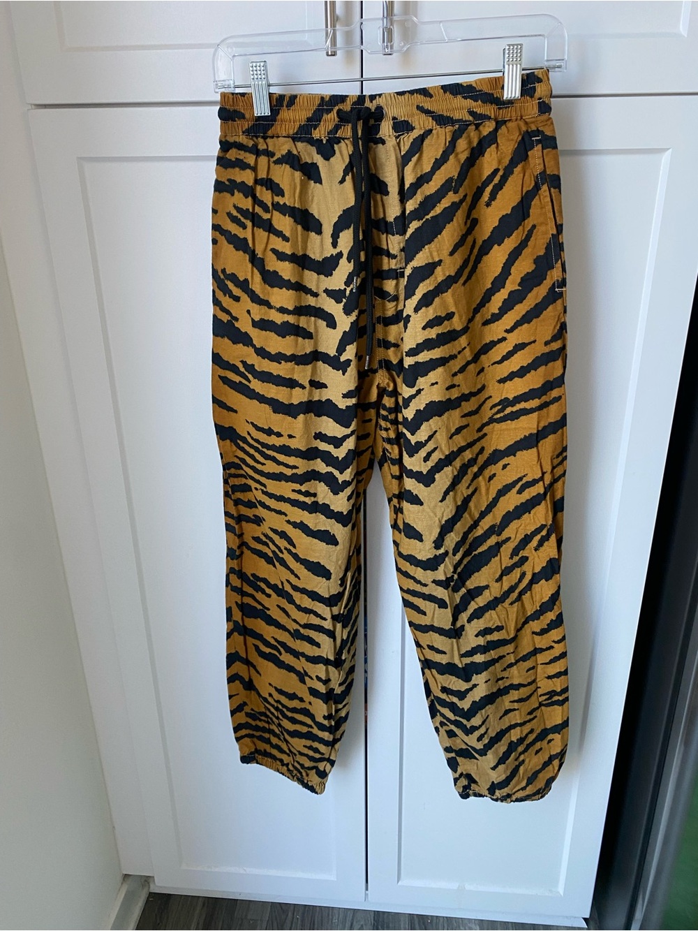 Urban Outfitters womens small zebra gold lion jogger pants
